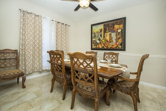 dining space featuring ceiling fan