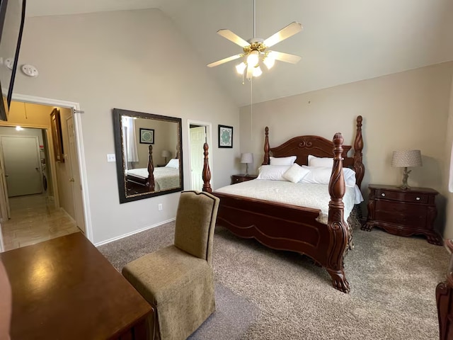 carpeted bedroom featuring ceiling fan and high vaulted ceiling