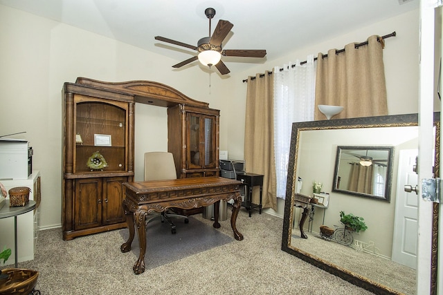 office space with carpet and ceiling fan