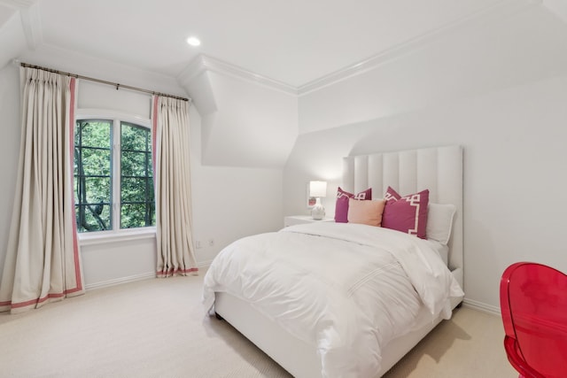 carpeted bedroom with multiple windows, vaulted ceiling, and crown molding