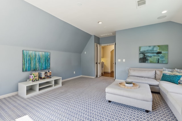 living room with lofted ceiling and carpet flooring