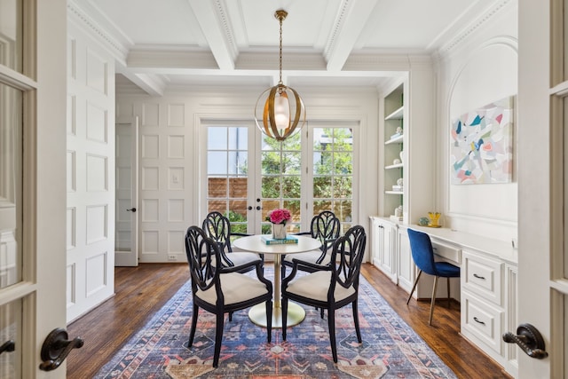 dining space with built in desk, crown molding, dark hardwood / wood-style flooring, french doors, and built in features