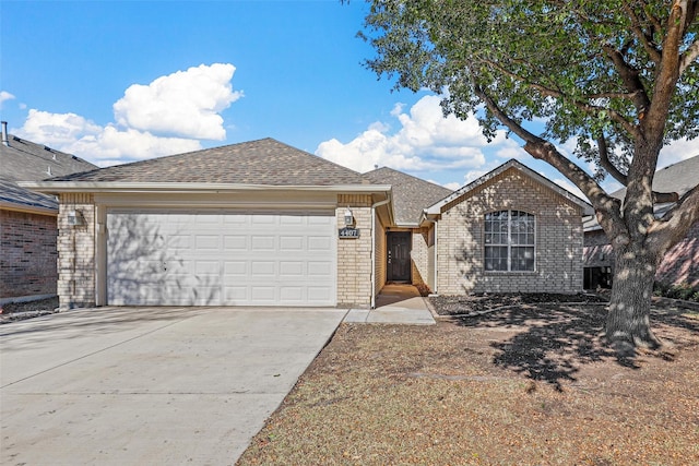 single story home with a garage