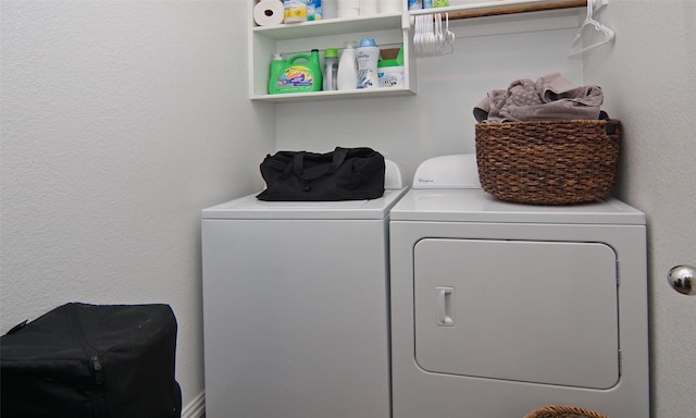 washroom featuring independent washer and dryer