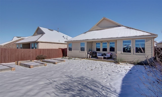 view of snow covered house