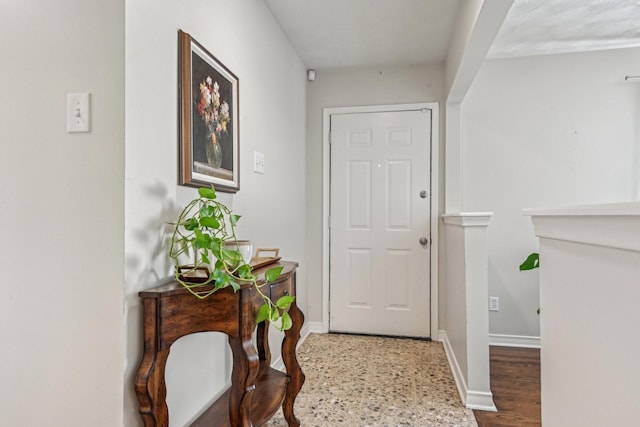 doorway with baseboards