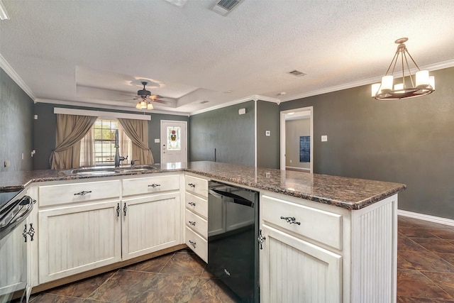 kitchen featuring black dishwasher, a raised ceiling, ornamental molding, ceiling fan with notable chandelier, and hanging light fixtures