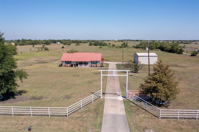 birds eye view of property featuring a rural view