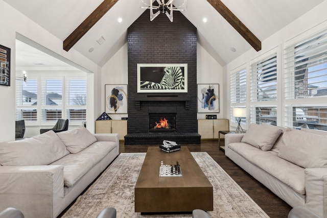 living room with a fireplace, high vaulted ceiling, dark hardwood / wood-style floors, and beamed ceiling