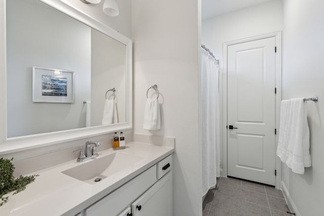 bathroom with vanity and tile patterned flooring