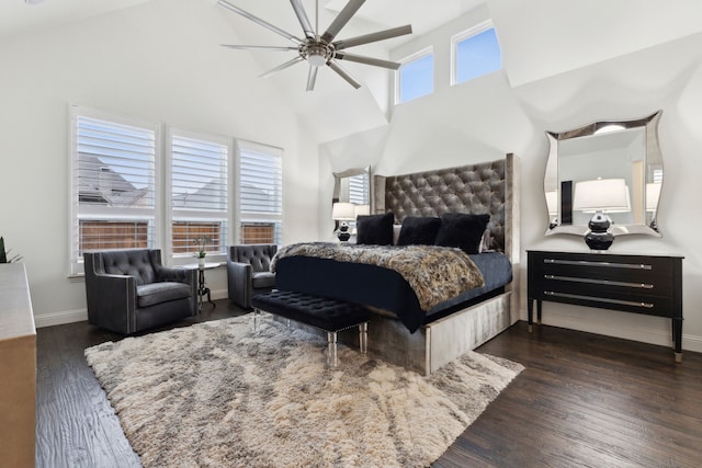 bedroom with multiple windows, high vaulted ceiling, dark wood-type flooring, and ceiling fan