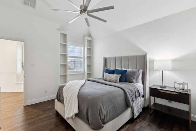 bedroom with lofted ceiling, dark wood-type flooring, and ceiling fan