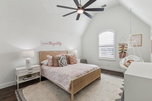 bedroom with lofted ceiling, dark hardwood / wood-style floors, and ceiling fan