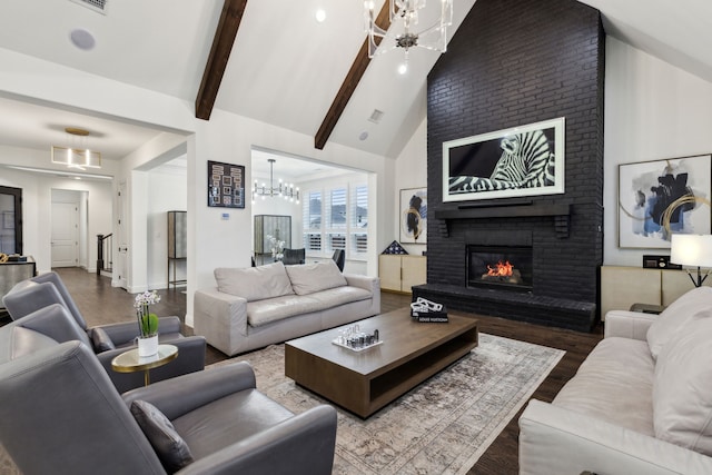 living room with hardwood / wood-style flooring, beam ceiling, high vaulted ceiling, a notable chandelier, and a brick fireplace