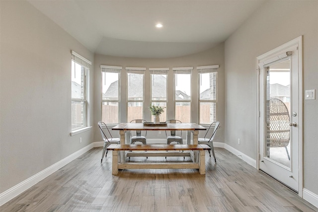 dining area featuring light wood-type flooring