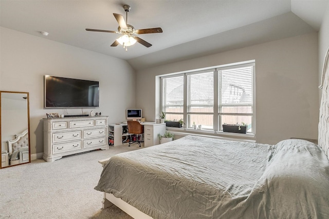 carpeted bedroom with lofted ceiling and ceiling fan