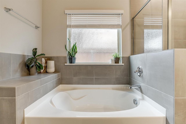 bathroom featuring a bath