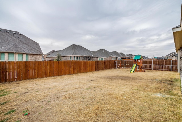 view of yard with a playground