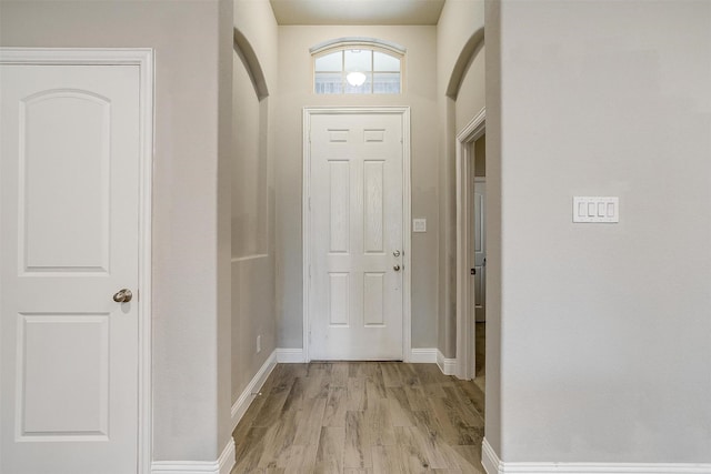 foyer with light hardwood / wood-style floors