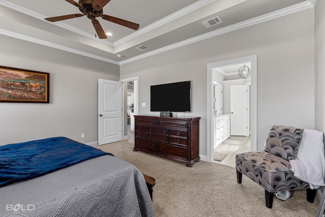 bedroom featuring ceiling fan, light colored carpet, ornamental molding, and a raised ceiling