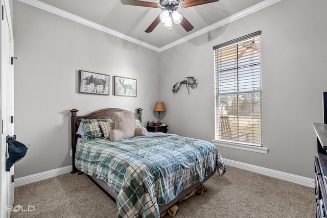 carpeted bedroom featuring ceiling fan, crown molding, and multiple windows