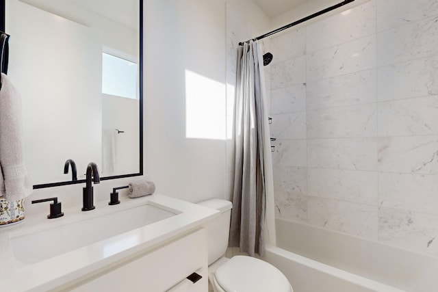 full bathroom featuring toilet, vanity, and shower / bath combination with curtain