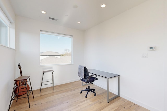 home office featuring light hardwood / wood-style flooring