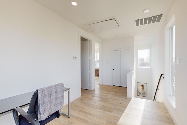 home office with light wood-type flooring