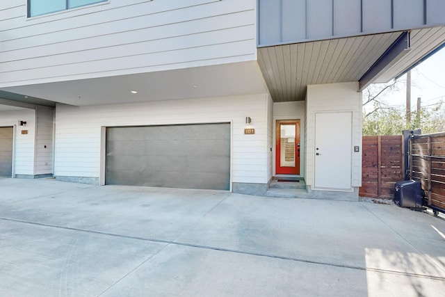 view of exterior entry with a garage