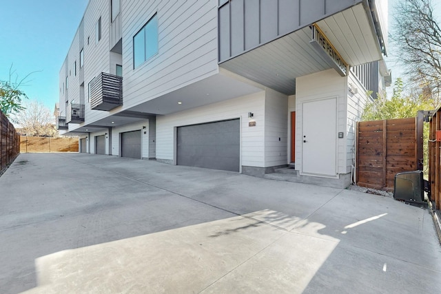 view of property exterior with a garage