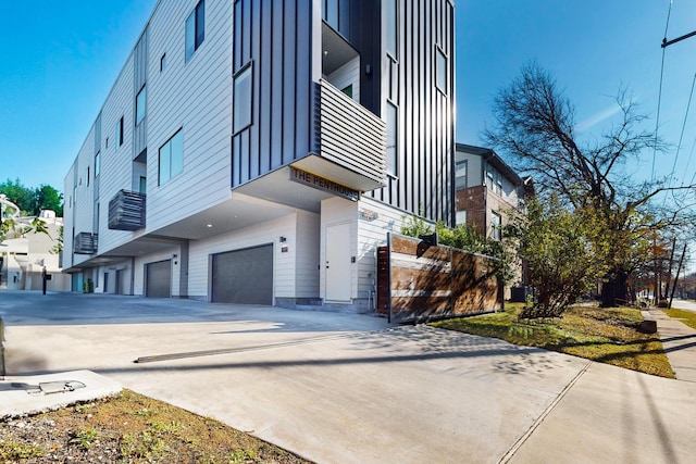 view of property exterior featuring a garage