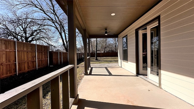 view of patio featuring ceiling fan