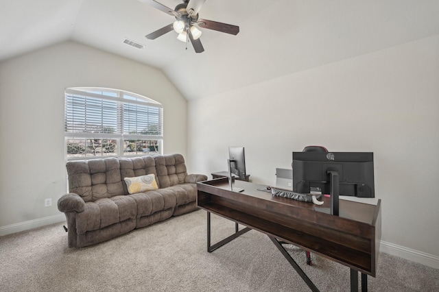 carpeted office space featuring ceiling fan and lofted ceiling