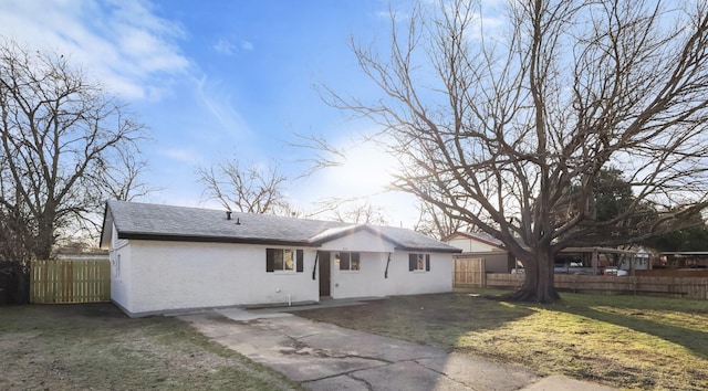 exterior space featuring a patio and a front yard