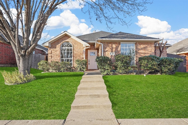 view of front of home with a front lawn