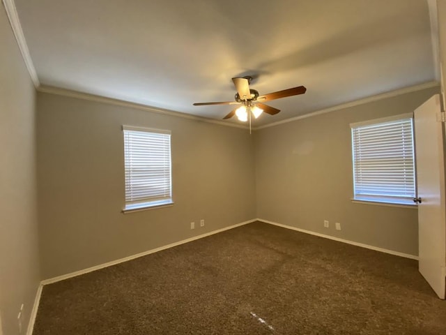 carpeted empty room with ceiling fan and crown molding