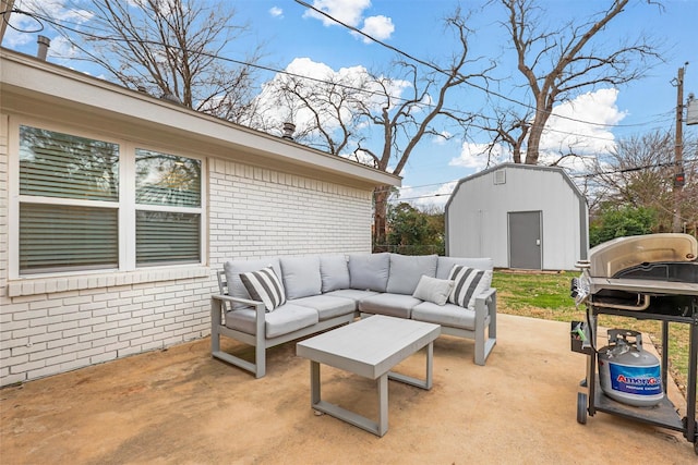 view of patio featuring a storage shed, outdoor lounge area, and grilling area