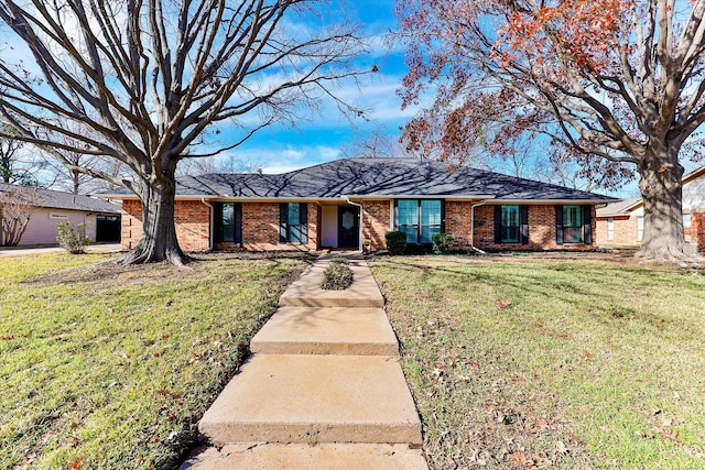 ranch-style house with a front yard