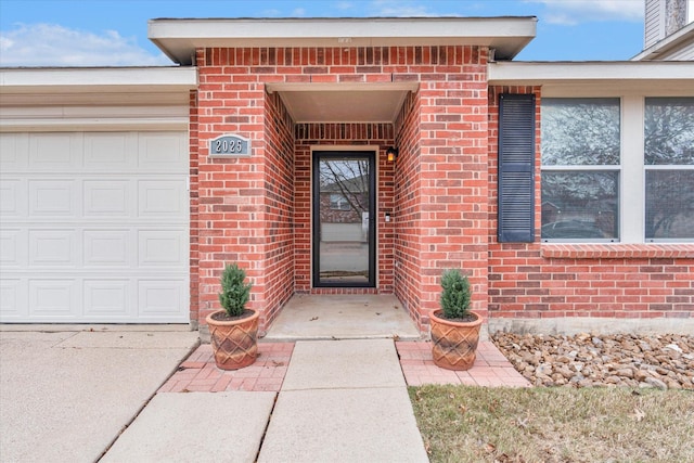 entrance to property featuring a garage