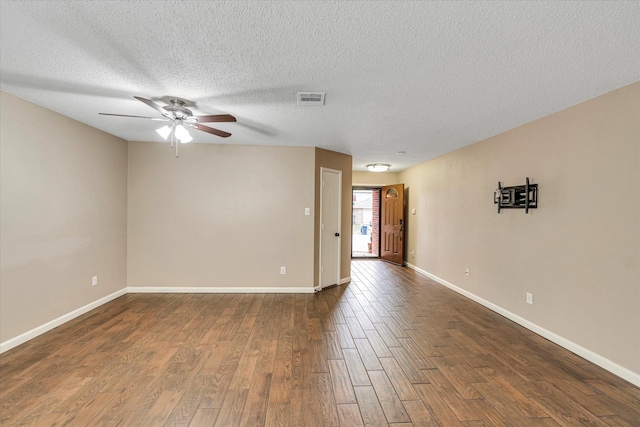 unfurnished room featuring hardwood / wood-style floors, a textured ceiling, and ceiling fan