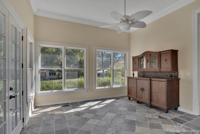 sunroom / solarium with ceiling fan