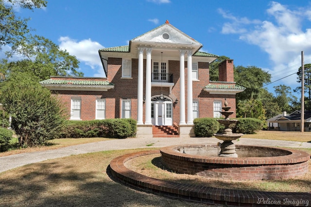 view of greek revival inspired property