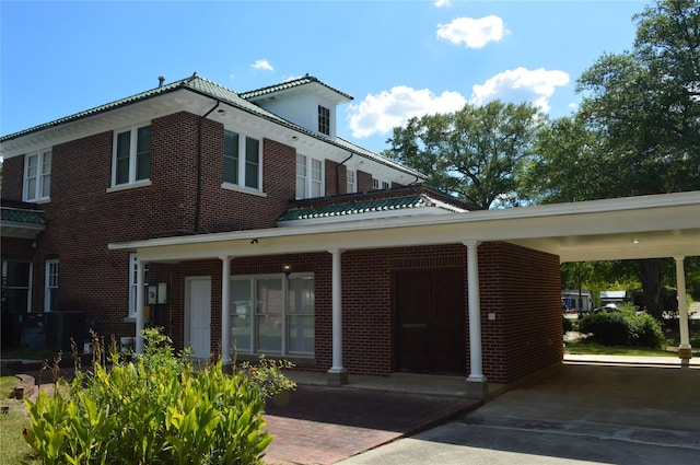 view of front of home with a carport