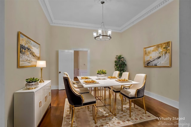 dining space with ornamental molding, dark hardwood / wood-style floors, and a notable chandelier