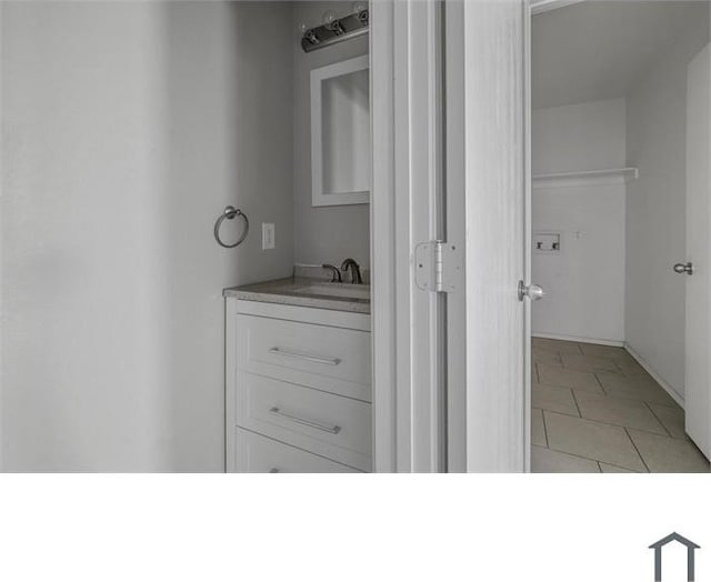 bathroom with vanity and tile patterned floors