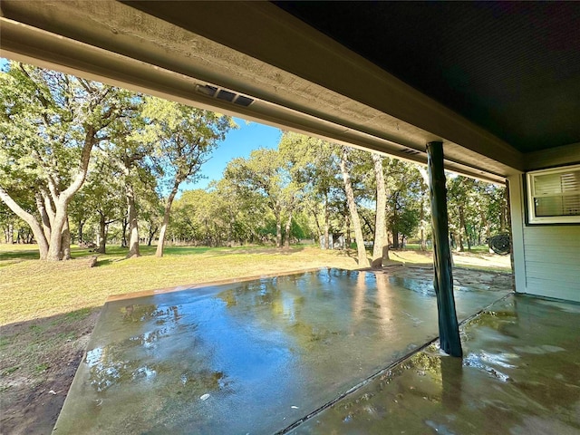 view of swimming pool featuring a lawn