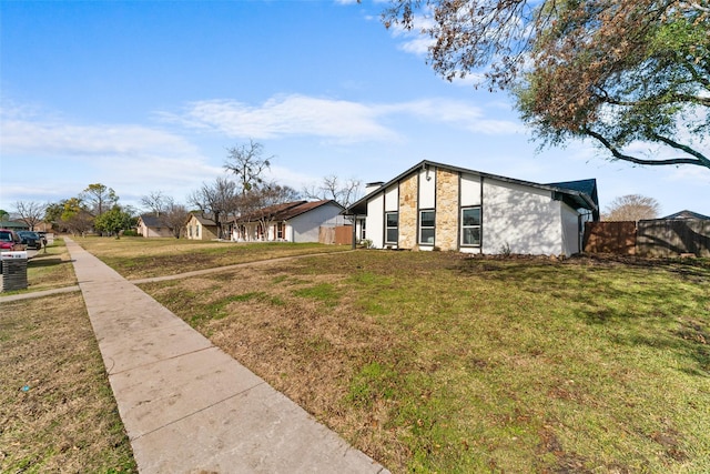 exterior space with a front yard