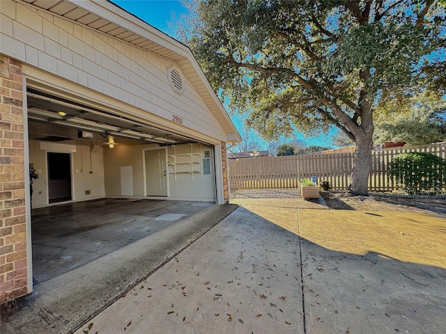 garage with fence