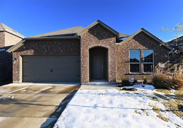 view of front of home with a garage