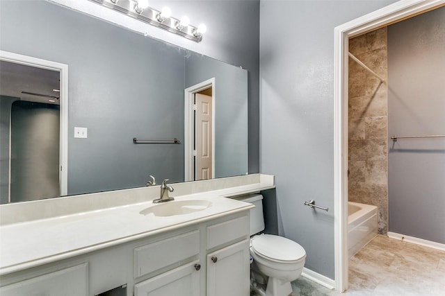 bathroom featuring toilet, bathing tub / shower combination, baseboards, and vanity